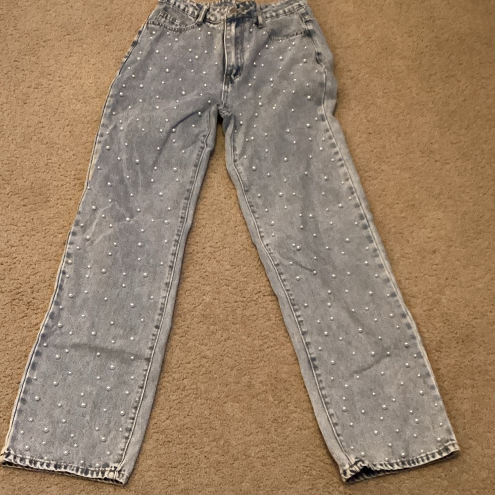 Super cute jeans with pearl design on front